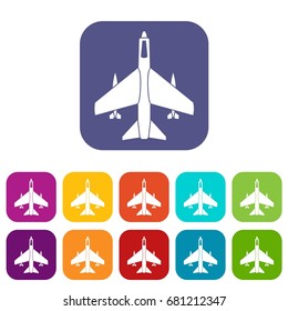 Armed fighter jet icons set vector illustration in flat style in colors red, blue, green, and other