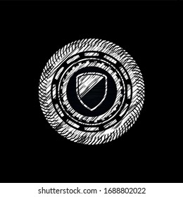 armor icon drawn on a blackboard