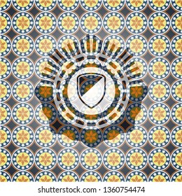 armor icon inside arabic style badge. Arabesque decoration.
