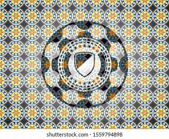 armor icon inside arabic style badge. Arabesque decoration.