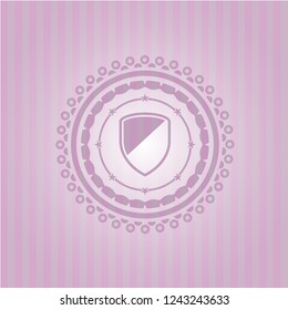armor icon inside badge with pink background