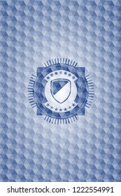 armor icon inside blue badge with geometric pattern background.