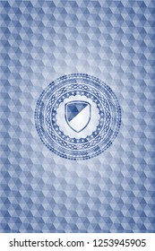 armor icon inside blue badge with geometric pattern background.