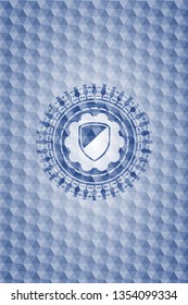 armor icon inside blue emblem or badge with geometric pattern background.