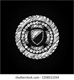 armor icon inside chalkboard emblem