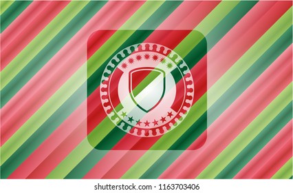 armor icon inside christmas colors style emblem.
