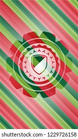 armor icon inside christmas colors style badge.