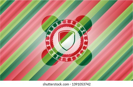 armor icon inside christmas colors badge.