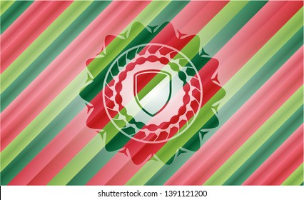 armor icon inside christmas style emblem.