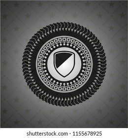 armor icon inside dark badge or emblem