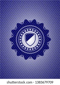 armor icon inside emblem with denim high quality background