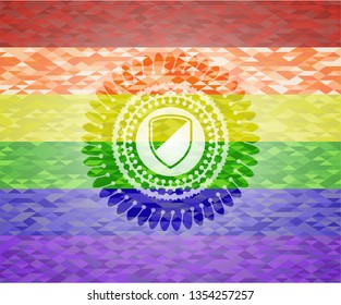  armor icon inside emblem on mosaic background with the colors of the LGBT flag