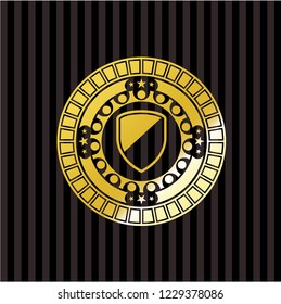 armor icon inside golden emblem or badge