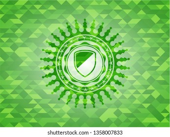 armor icon inside green emblem. Mosaic background