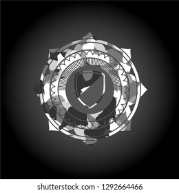 armor icon inside grey camo emblem