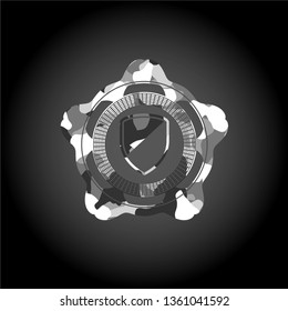 armor icon inside grey camo emblem