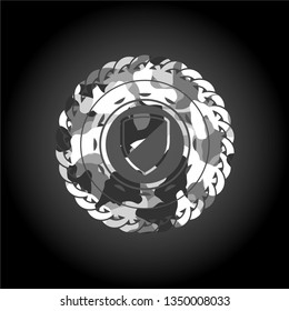 armor icon inside grey camouflaged emblem