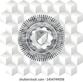 armor icon inside grey icon or emblem with geometric cube white background