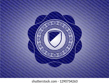 armor icon inside jean or denim emblem or badge background