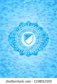 armor icon inside light blue emblem with triangle mosaic background