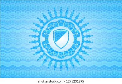 armor icon inside light blue water wave style emblem.