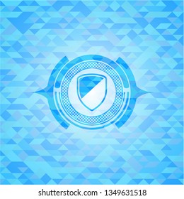 armor icon inside light blue emblem with mosaic background