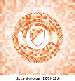 armor icon inside orange mosaic emblem with background