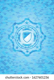 armor icon inside realistic light blue mosaic emblem