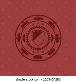 armor icon inside red emblem. Vintage.