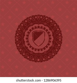 armor icon inside red emblem. Vintage.