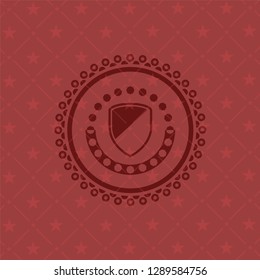armor icon inside red emblem. Vintage.