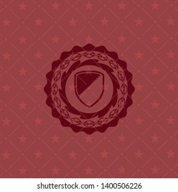 armor icon inside red emblem