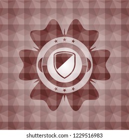 armor icon inside red seamless badge with geometric background.