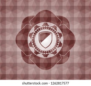 armor icon inside red seamless emblem or badge with geometric pattern background.