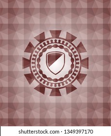 armor icon inside red seamless emblem or badge with abstract geometric polygonal pattern background.