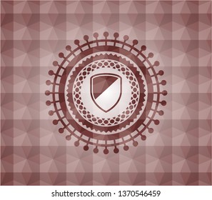 armor icon inside red seamless geometric emblem.