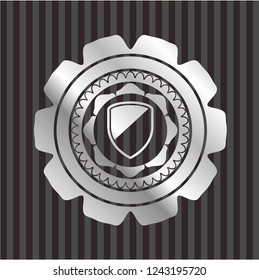 armor icon inside silver badge or emblem