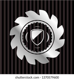 armor icon inside silver shiny emblem
