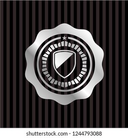 armor icon inside silvery badge