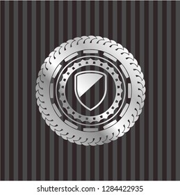 armor icon inside silvery shiny badge