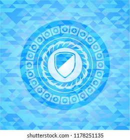 armor icon inside sky blue emblem with mosaic background