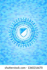 armor icon inside sky blue emblem with mosaic background
