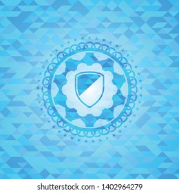 armor icon inside sky blue mosaic emblem