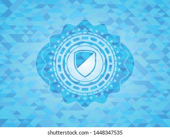 armor icon inside sky blue mosaic emblem