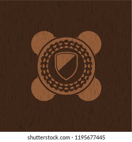 armor icon inside vintage wooden emblem