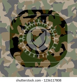 armor icon on camouflaged pattern