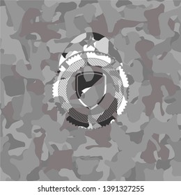 armor icon on grey camouflage pattern