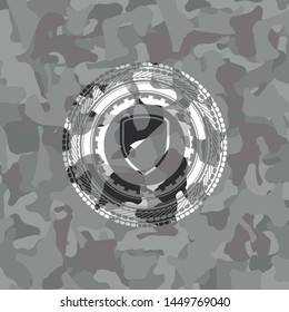 armor icon on grey camouflaged texture