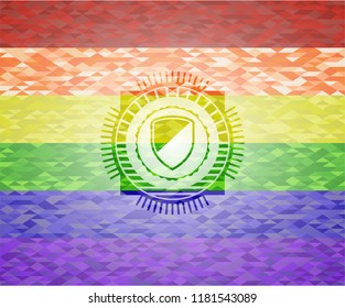 armor icon on mosaic background with the colors of the LGBT flag