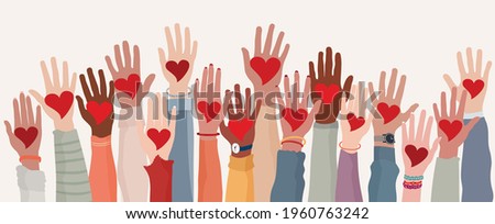 Arms and hands raised. Group of diverse people with heart in hand. Charity donation and volunteer work. Support and assistance. Multicultural and multiethnic community. People diversity